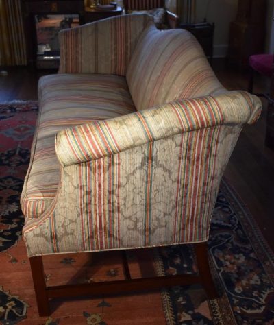 Chippendale sofa with silk blend damask cover  side view