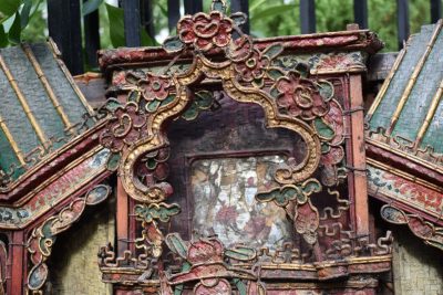 Chinese polychrome-decorated architectural panel, constructed with intricate basketwork and metal details.