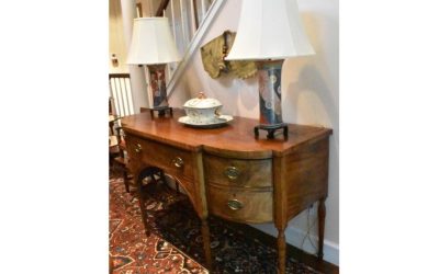 English Sheraton sideboard with a shaped top having arcaded corners
